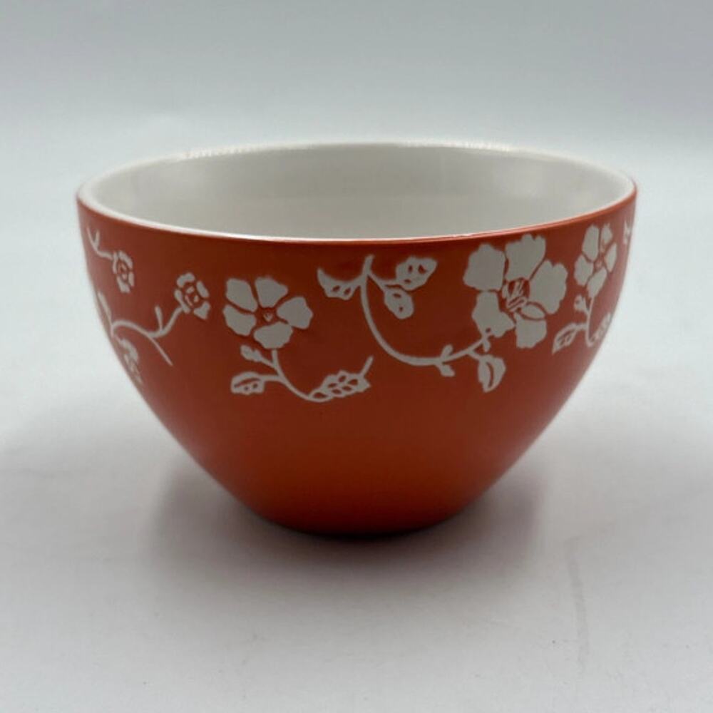 Small Orange Ceramic Bowl With Embossed Floral Pattern Echo Point